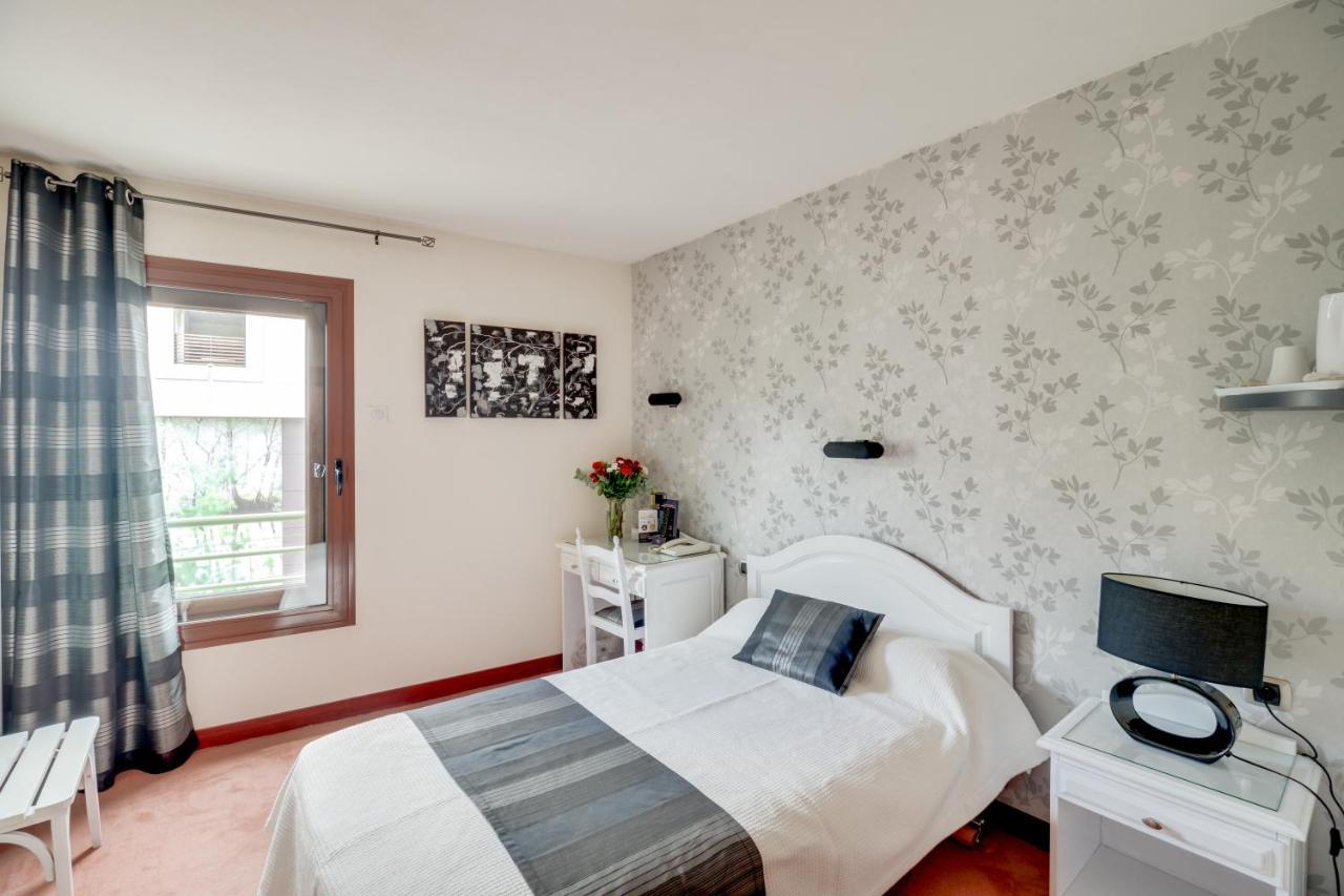 Contact Hotel Limoges - Hotel Des Deux Moulins المظهر الخارجي الصورة